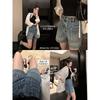 Shorts de Mezclilla para Herramientas Frescas de Algodón de Xinjiang Baishi Wang para Mujer Verano Lavado Viejo Cintura Alta Rectos Adelgazantes de Cadera