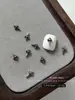 1000 piezas Plata Antigua Cruz Arte de Uñas Aleación Adornos Estilo Oscuro Punk Flor Decoración de Uñas Bolsa Completa Personalizado Venta al por Mayor