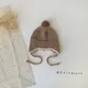 Gorro de Bebé Lindo con Bola de Pelo Estilo Coreano Otoño e Invierno Estilo Nuevo Protección para Orejas Cálido Cortavientos con Cordones Gorro de Lana para Niños y Niñas