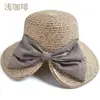 Chapéu Moda Feminina Estilo Coreano Verão Novo Chapéu de Proteção Solar para Exterior Chapéu de Palha com Aba Larga de Algodão e Linho com Laço para Mulheres