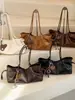 Bolsa de ombro casual grande capacidade 2026 transfronteiriça para mulheres, bolsa tote simples para o dia a dia, bolsa versátil de ombro com estilo descontraído