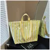 Bolso de mujer transfronterizo de gran capacidad súper popular 2026 nuevo diseño de moda versátil tipo tote bolso de mano casual versátil para el trabajo y el día a día