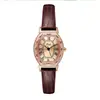 Reloj de mujer GEDI estilo antiguo con forma de barril, esfera pequeña, correa de cuero, marcadores de números romanos vintage, marrón oscuro