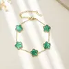 Suministro de fábrica pulseras de acero de titanio lucky trébol de cuatro hojas flor de cinco pétalos nácar tendencia europea y americana de lujo nicho sin decoloración al por mayor