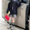 Suéter para Niña Otoño Invierno 2026 Estampado de Lunares Franceses Pulóver Moda para Niña Estilo Perezoso Tejidos Venta al por Mayor Transfronteriza