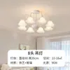 Lámpara de araña de lujo ligero estilo francés para sala de estar y dormitorio con pétalos de arte de hierro y diseño de iluminación con decoración de lazo