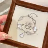 2025 nuevo exquisito pulsera de calabaza de lirio blanco luna pulsera de diamante de alta calidad diseño de nicho de lujo ligero