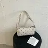 Diseño de Nicho Transfronterizo Bolso Simple de Lunares Verano 2026 Nueva Moda Versátil Elegante Personalidad Bolso Cilindro Bajo el Brazo