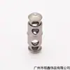 Hebilla elástica de metal de doble cabeza cilíndrica con dos agujeros para cordón, hebilla de resorte T5008