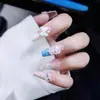 Linda Arte de Uñas 3D Hecho a Mano de Hello Kitty con Lazos y Cuentas de Colores para un Look Femenino