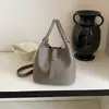 Estilo de CelebridadBAMPO Bolso Cesta Echo de Pendiente Medio, Nuevo Bolso Cubo de Piel de Vaca de Capa Superior, Cruzado y Bolso de Mano