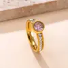 Anillo de Moda de Acero Inoxidable de Venta Caliente Transfronteriza Soldado Marca Incrustado con Anillo de Circonita Redonda Diseño de Nicho Femenino Fábrica de Joyería de Acero de Titanio