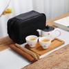 Juego de té de viaje kung fu de cerámica bolsa portátil cruz taza exprés Zhenyan una olla dos tazas tetera pequeña taza de té