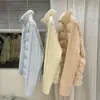 Jaqueta de algodão com gola alta, patchwork de tricô com bordado de letras e color block para mulheres, novo casaco puffer curto versátil de inverno