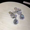 Aretes de aguja plateada con diamantes, diseño de flor ovalada de resina y gota de agua, estilo retro vintage, aretes versátiles