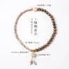 Novo bracelete de dupla volta estilo chinês com contas de bodhi e sândalo em formato de estrela-lua, bracelete budista tradicional de contas de bodhi queimado em carvão com garra de gato para mulheres