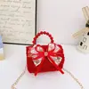 Nova Bolsa Festiva Vermelha de Ano Novo para Crianças Fofa com Laço Nova Bolsa de Mão de Ano Novo Bolsa de Ombro com Corrente para Menina Doce