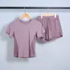 Traje deportivo para mujer Wide Pine Verano Delgado Transpirable Traje de yoga traje Correr Entrenamiento Pantalones cortos anti-rozaduras Secado rápido Manga corta