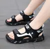 Sandalias para Niños 2025 Verano Nuevas Deportivas para Niños Suela Suave Niños Medianos y Grandes Moda Zapatos de Playa para Bebé Venta al por Mayor