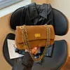 Bolsa Feminina 2026 Nova Ombro Único Acolchoada de Diamante com Corrente Transversal Bolsa de Mão Versátil de Nicho Moda Luxo Leve Casual