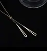 Popular estilo coreano chapado en oro de 18 quilates triángulo borla Cadena universal ins estilo frío moda moderna titanio acero inoxidable collar