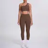 Nuevo Conjunto de Ropa Deportiva de Yoga Ajustada Color Nude de un Hombro Espalda Hermosa Sujetador Deportivo Set de Cintura Alta Elevación de Glúteos Traje de Running Fitness para Mujer