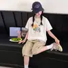 Camiseta de Manga Corta de Dibujos Animados para Niñas Verano Estilo Delgado 2026 Nueva Camiseta Holgada para Niños Camisa de Algodón Puro de Media Manga Moderna