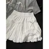 Saia Flor Botão Laço Design Nicho Feminina Pequena Cintura Alta Combina com Tudo Emagrecimento A-line Rodada Curta