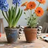 Enfeites de Halloween Transfronteiriços Novo Conjunto de Dois Pingentes de Caveira de Resina Vasos de Flores para Pátio Externo Decorações de Mesa para Varanda