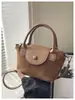 Bolsa de mão de alta qualidade da moda bolsa transversal bolsa feminina mais vendida bolsa de ombro casual simples bolsa de balde de alta qualidade