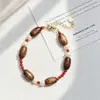 Conjunto de Pulsera y Collar de Perlas de Agua Dulce Naturales y Madera de Ágar de Alta Calidad