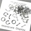 Venta al por mayor transfronteriza europea y americana de accesorios para uñas, remaches perforados estilo punk de chica popular, anillos metálicos, decoraciones para arte de uñas