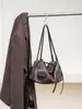 Bolsas de Couro Genuíno Outono Inverno 2026 Couro de Vaca Ombro Único Transversal Bolsas Tote Femininas Alto Padrão para o Dia a Dia