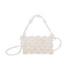 Bolso de hombro estilo coreano para niñas, moderno, de color liso, con perlas dulces, bandolera para niños, nuevo bolso hueco de verano.