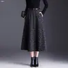 Falda midi de lana mezclada de cintura alta con letras, adelgazante, temperamento, para mujer, temporada otoño e invierno 2026, nueva, cubre las caderas
