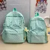 Mochila escolar de estilo coreano con lazo de lunares para niñas, adecuada para estudiantes de secundaria, preparatoria, universitarios y uso diario, así como para viajes