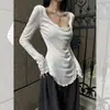 Camiseta branca de manga longa com babados irregulares para mulheres, novo design de nicho para o início do outono, acinturada, top de alta qualidade, estilo ins