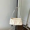 Bolso de verano 2026 para mujer, nuevo, blanco, plisado, tipo nube, para debajo del brazo, con textura, de nicho, versátil, para hombro y cruzado.