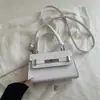Bolso Pequeño Cuadrado de Moda con Hebilla de Cierre de Patrón de Cocodrilo 2026 Nuevo Bolso Cruzado Casual de Moda de Nicho Bolso de Hombro para Mujer de Gama Alta