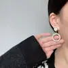 Brincos de estrela de cinco pontas com design geométrico de Coringa em estilo coreano, personalidade europeia e americana, design doce, brincos de Coringa explosivos