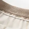 Novas calças retas estilosas para o outono e inverno de 2026, projetadas para mulheres de meia-idade e idosas, com cintura elástica, corte reto e design versátil e longo.