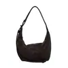 Bolsa de axila tipo "dumpling" de gran capacidad transfronteriza para mujer, nuevo modelo 2026, adecuada para el trabajo y los desplazamientos, con un toque de alta gama, diseño de patchwork, de un solo hombro y bandolera