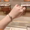 Brazalete Baojia Versión Alta con Forma de Serpiente para Mujer Chapado en Oro Rosa de 18K Lleno de Diamantes Hueso de Serpiente Múltiples Círculos Cabeza de Serpiente Brazalete Abierto con Diamantes