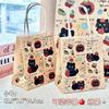 Bolsa de papel kraft de alto valor de color ins manzana gato negro pequeño linda bolsa de embalaje para regalo caricatura exquisita bolsa de mano venta al por mayor