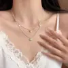 Pingente Coração Perolado com Borla de Zircônia Colar de Pérolas Coração Corrente de Clavícula Vintage Francês Colar de Luxo Leve de Alta Qualidade para Mulheres