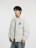 Chaqueta de algodón para hombre con cuello mao, corte holgado, nuevo estilo invierno 2026, simple y versátil, con un toque de alta gama, sin capucha, proporcionando calidez