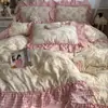 Estilo ins, fresco y simple, juego de ropa de cama de cuatro piezas de algodón puro, diseño de princesa estilo coreano, algodón lavado, estampado floral, ribete floral grande, juego de tres piezas apto para estudiantes