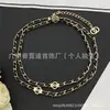 Cadena de suéter de cuero Xiangjia transfronteriza, nueva, con doble C y múltiples accesorios, collar largo de cuero finamente elaborado de alta calidad