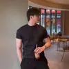 Nueva Camiseta Casual de Algodón Tejido de Canalé Doble Peso Pesado Cuello Redondo Pequeño Holgada Color Sólido Transpirable Puño Manga Corta Cuatro Estaciones