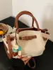 Bolso Elegante de Alta Capacidad para Mujer Modelo Nuevo Verano 2026 Exquisito Bolso de Mano Estilo Cesta para el Trabajo y los Viajes Diarios Bolso Cruzado